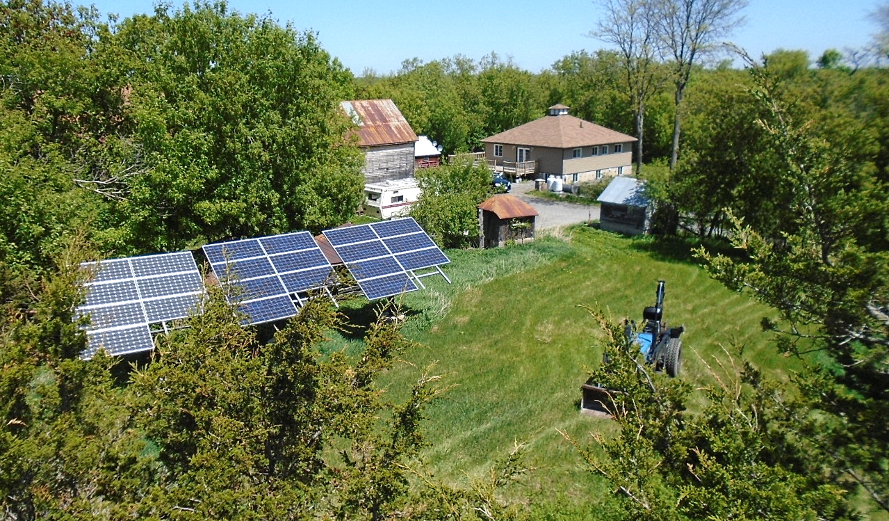 
 View of Solar Array and House from Scissor Lift.